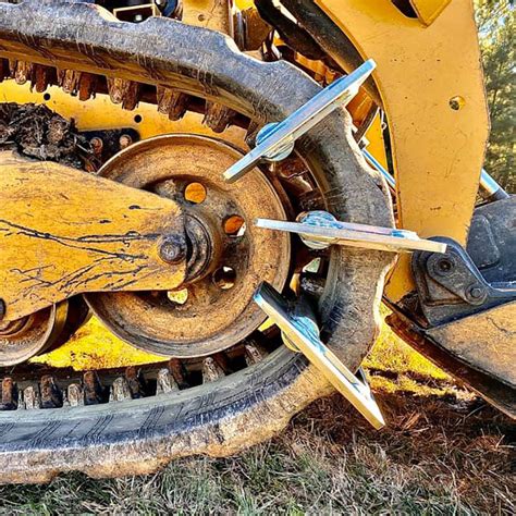 skid steer track bites|Grizzly™ Rubber Tracks .